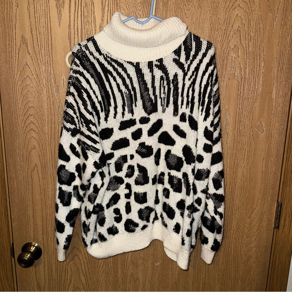 Torrid Black and Cream Animal Print Turtleneck Sweater